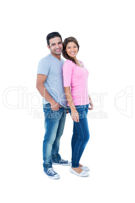 Happy couple standing together and looking at camera
