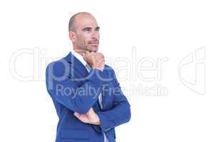 Businessman thinking with hand on chin