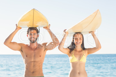 happy couple surfing