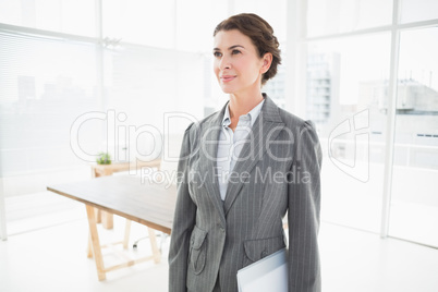 Thoughtful businesswoman looking away