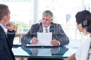 Business people in discussion in an office