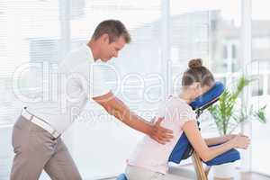 Woman having back massage