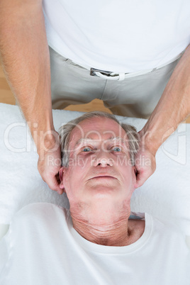 Man receiving neck massage