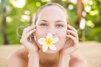 Peaceful blonde lying on massage table