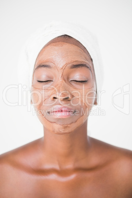 Pretty woman enjoying a chocolate facial treatment