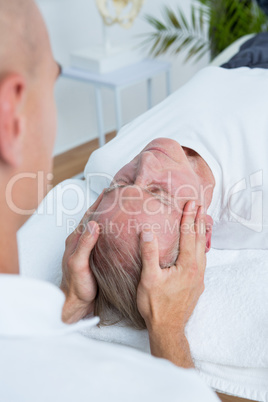 Man receiving head massage