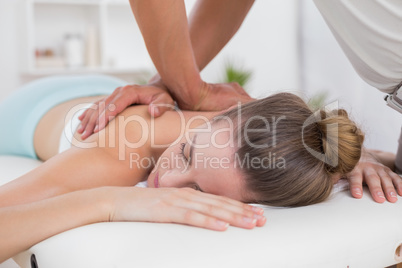 Physiotherapist doing back massage