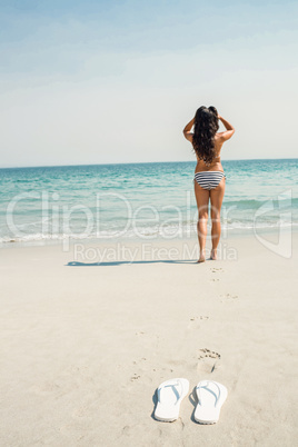 Rear view of woman looking at the ocean