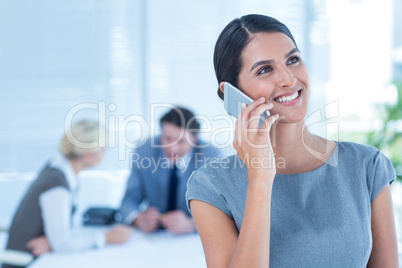 Smiling businesswoman having a phone call