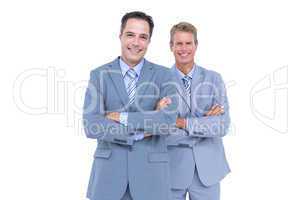 Business team standing arms crossed