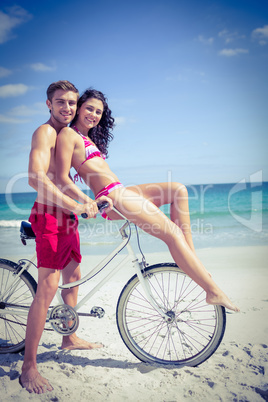 Happy couple going on a bike ride