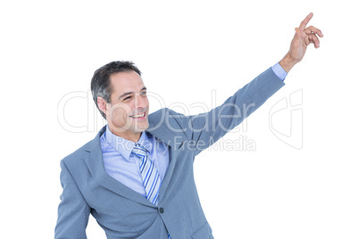 Cheerful businessman raising his hand