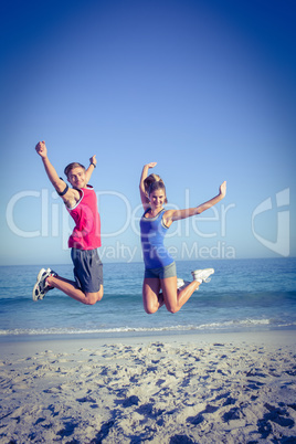 Happy couple jumping together