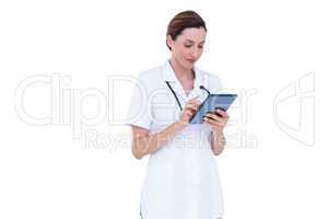 Confident doctor using tablet