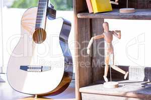 Close up of mannequin and guitar
