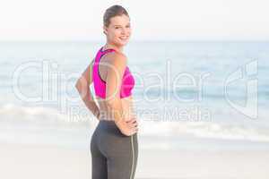 Portrait of beautiful fit woman looking at camera