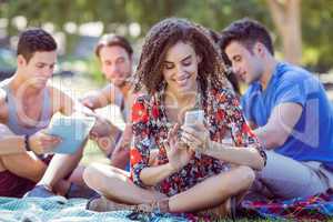 Cute curly hair girl using a phone