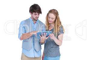 Happy couple holding tablet computer