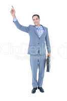 Cheerful businessman raising his hand