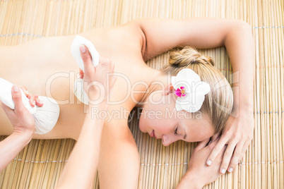 Attractive woman getting massage on her back