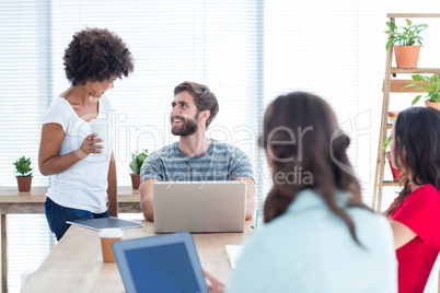 Happy business team working together