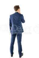 Wear view of businessman thinking