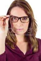 Pretty woman with glasses looking at camera