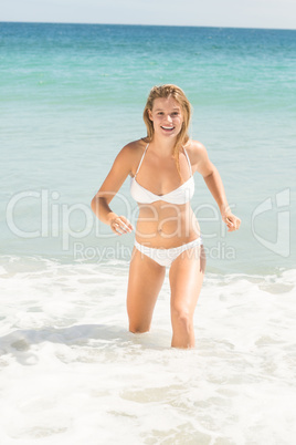 Pretty blonde going outside water