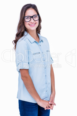 Pretty geeky hipster posing and smiling at camera