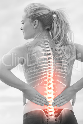 Highlighted spine of woman with back pain
