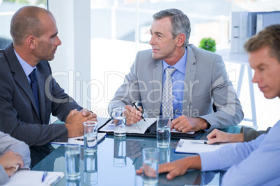 Business colleagues discussing about work Business colleagues discussing about work