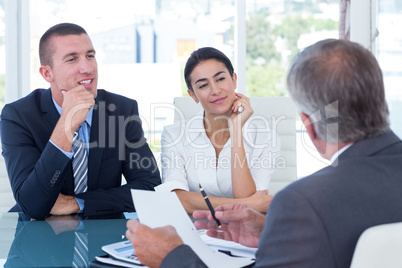 Business people in discussion in an office