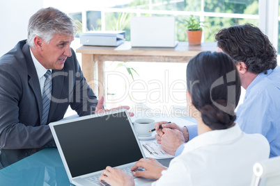 Business people in discussion in an office