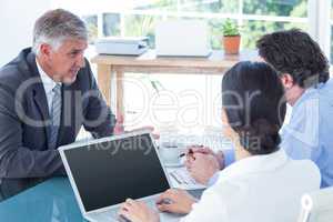 Business people in discussion in an office