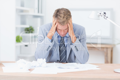 Businessman being depressed by working