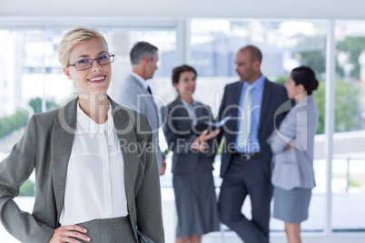 smiling businesswoman looking at the camera