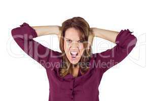Pretty brunette shouting with hands on head