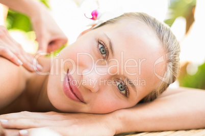 Attractive woman getting massage on her back