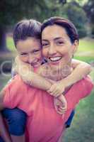 mother and daughter having fun in the park