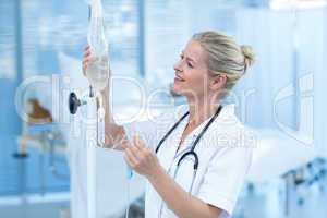 Nurse connecting an intravenous drip