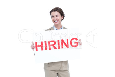 Businesswoman holding a hiring sign