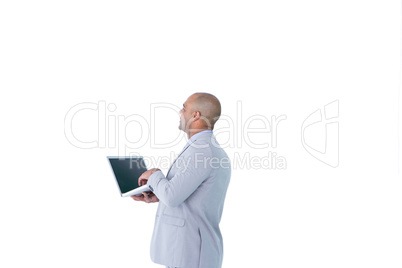 Businessman using his laptop computer