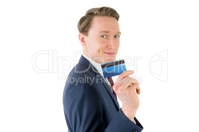 Businessman showing his credit card