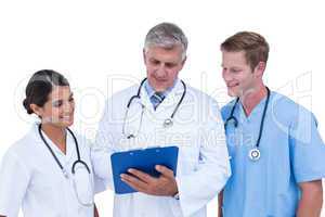Doctors and nurse discussing over notes