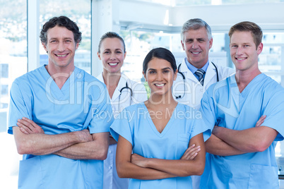 Team of smiling doctors looking at camera