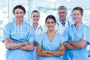 Team of smiling doctors looking at camera