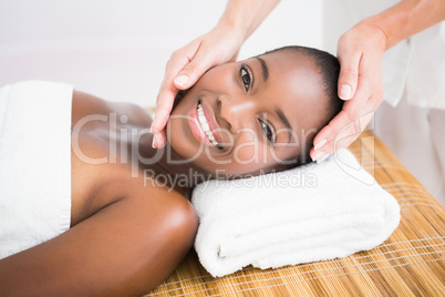 Pretty woman enjoying a head massage