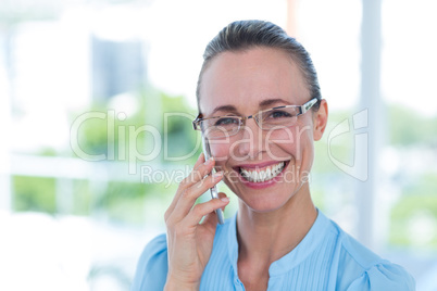 Smiling businesswoman having a phone call