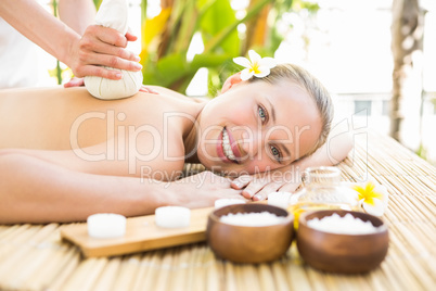 Attractive woman getting massage on her back