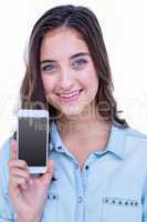 Pretty brunette smiling at camera with her smartphone